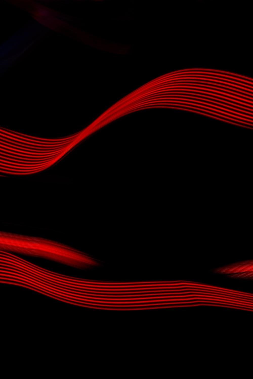 wavy red lines on dark background