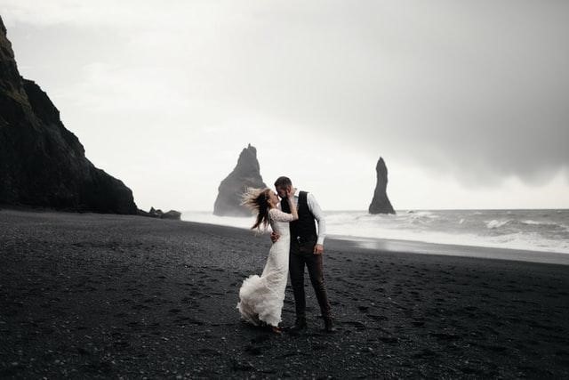 wedding shoot on dark beach