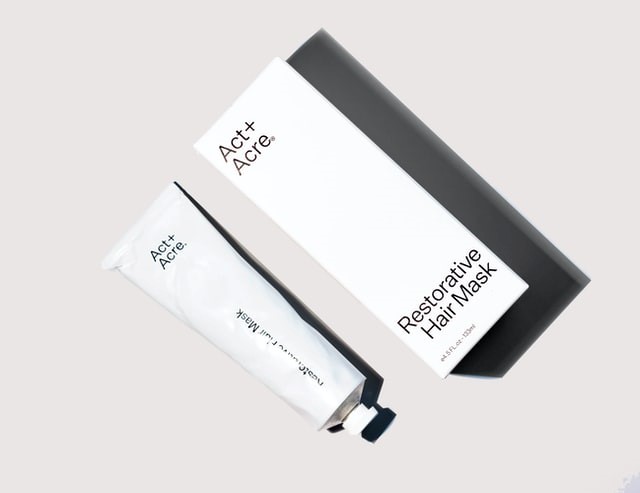 plain black on white hair cream packaging