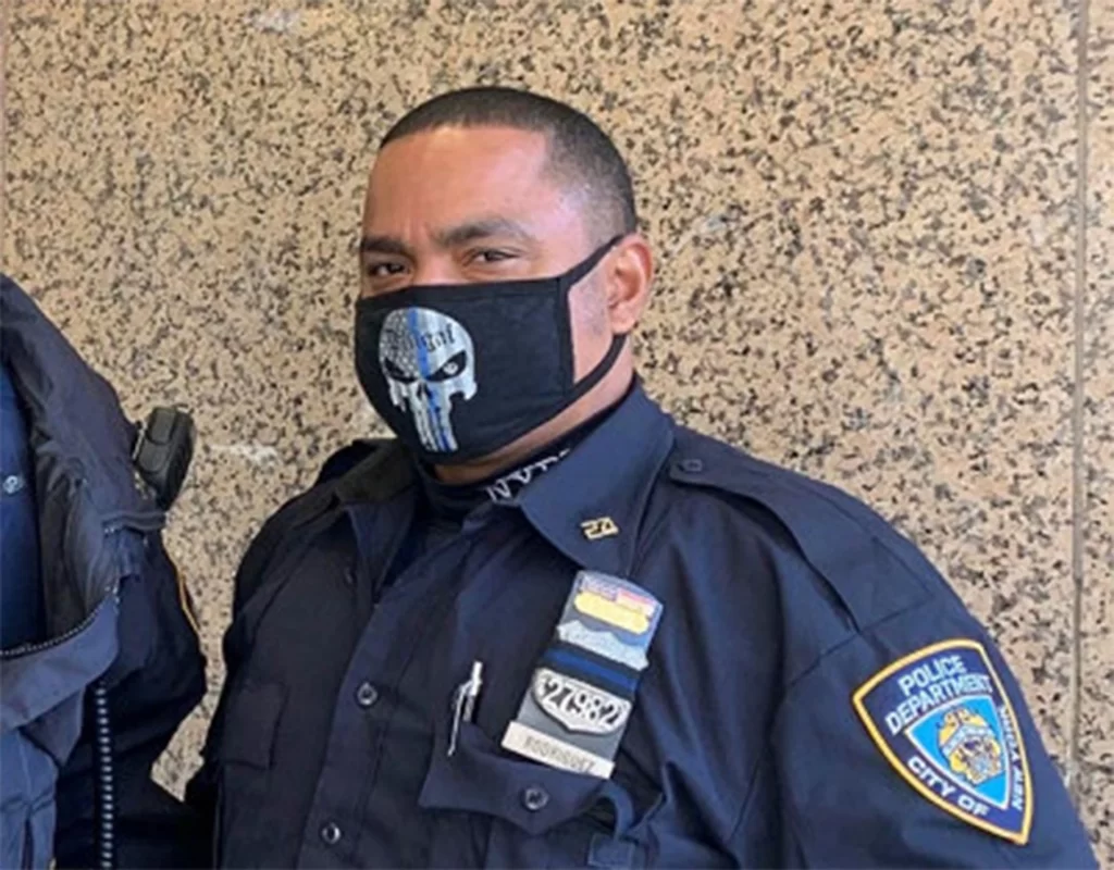 US Police officer with the Punisher logo on mask
